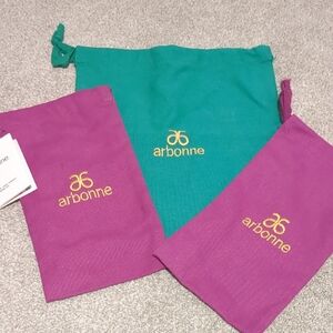 Arbonne Green and Magenta Pouches